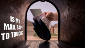 Image depicting a hand removing mail from a mailbox. Text: Is My Mail Safe to Touch?